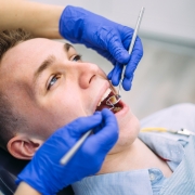 Boy at the dentist consultation. Checking and dental treatment in a clinic.
